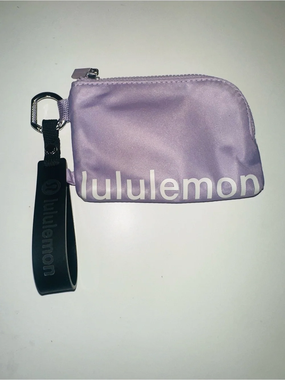 lululemon Lavender Zipper Pouch with Black Silicone Wrist Strap